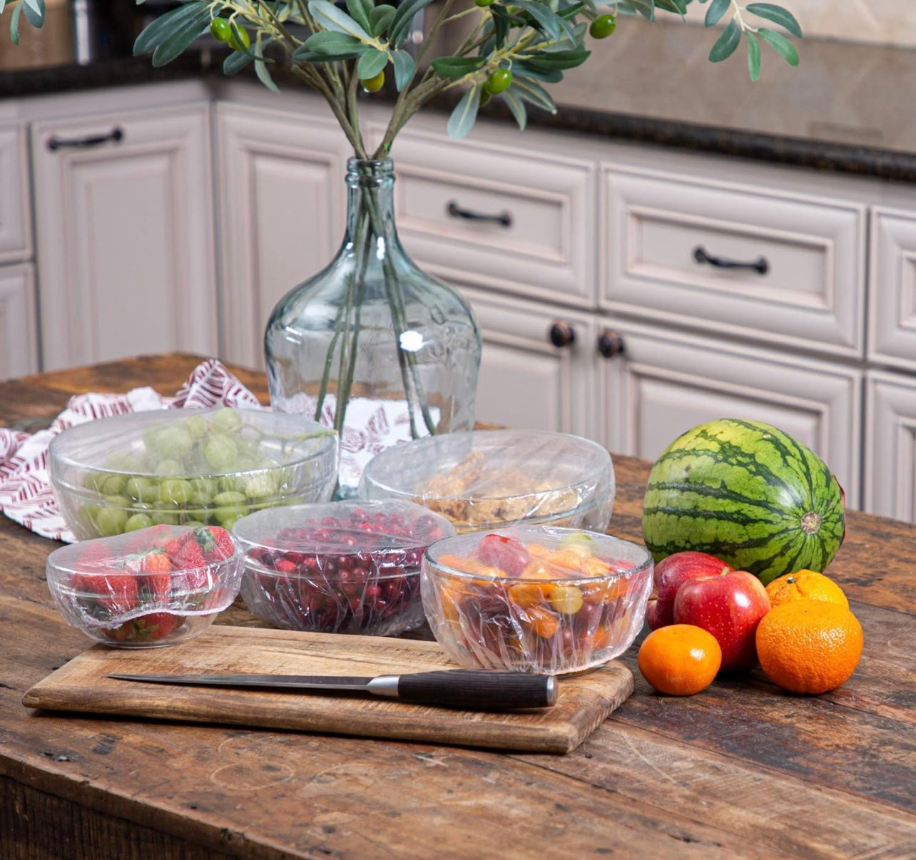 Disposable Plastic Wrap Food Covers: Elastic food lids for plates, fruit bowls etc. that eliminates the hassle of plastic wrap rolls when it comes to storage and plate saving.